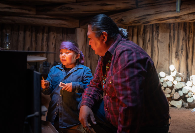 Low Income Home Energy Assistance Program Navajo Nation Division Of   Dad Teaching His Son To Lit A Traditional Stove Stock Photo 768x523 